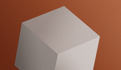 Bijela kocka na narančastoj pozadini